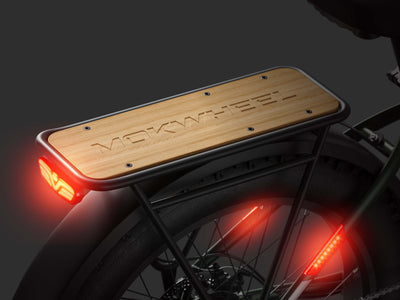Mokwheel ebike with sturdy rear rack and integrated fender for cargo support and protection