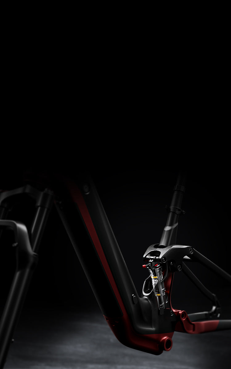 Mokwheel full suspension step-through e-bike absorbing gravel/pothole impacts