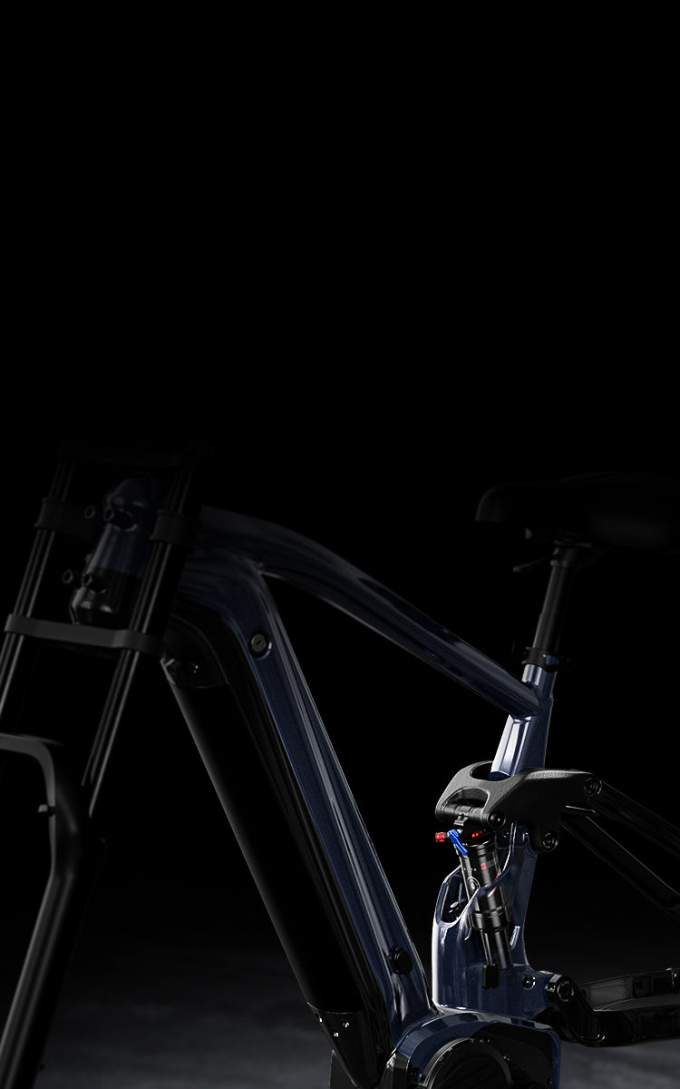 Full suspension system with front and rear shocks providing stability and comfort across rocks, potholes, and steep trails