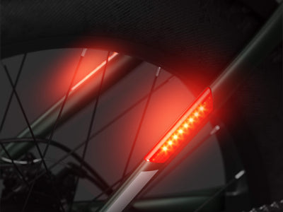 Mokwheel ebike with brake-activated red tail light for enhanced safety and visibility