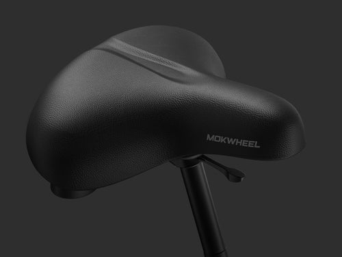 Thick, high-resilience padded saddle providing enhanced comfort and support for long rides over uneven surfaces.