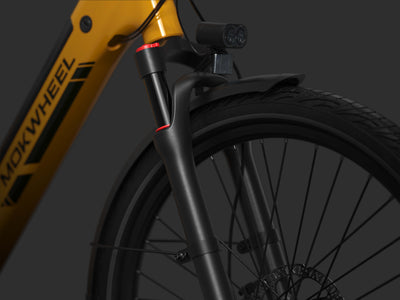 Mokwheel's dual-spring+hydraulic damping system absorbing road imperfections on urban streets