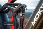Mokwheel mountain Obsidian e-bike absorbing bumps with DNM suspension
